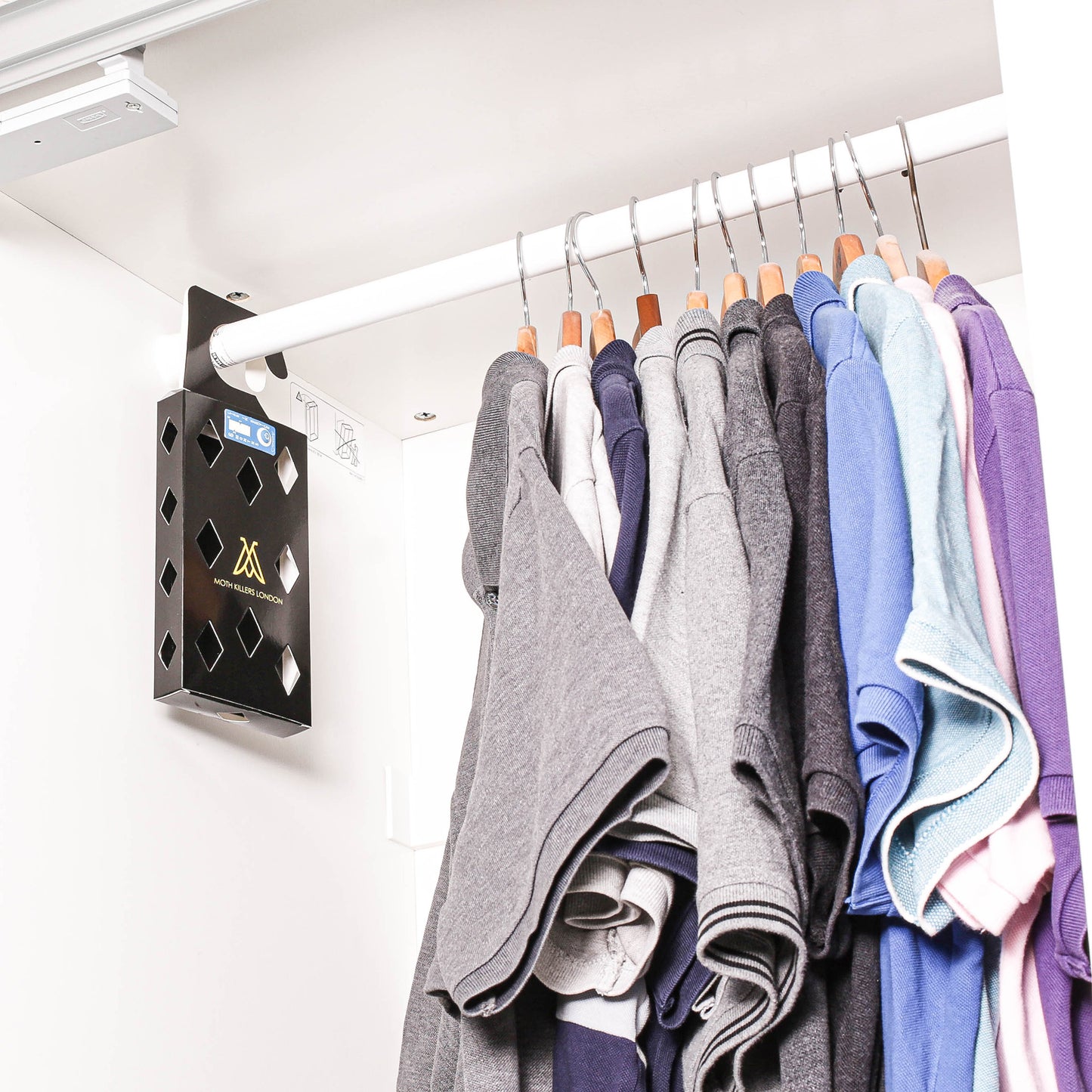 moth trap ltd moth pheromone box hanging in a wardrobe